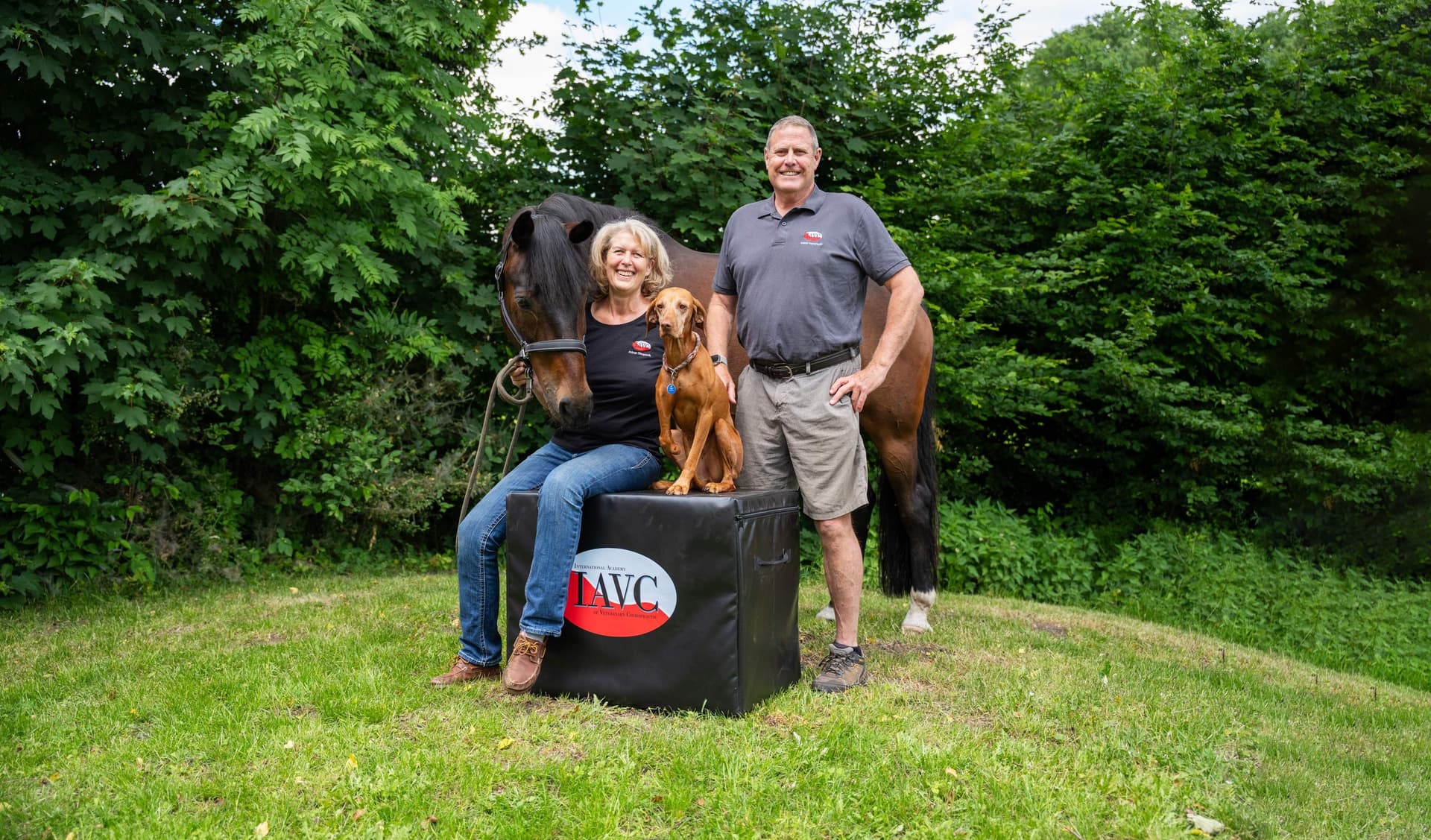 IAVC founders with a dog, horse and IAVC training box